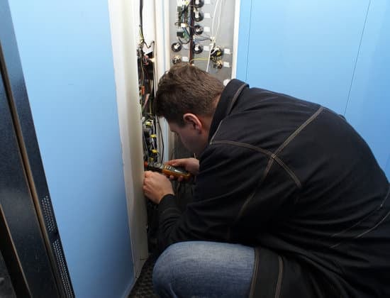 Man fixing the elevator