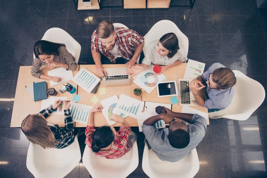 Top view of start-up multinational group of creative people having meeting