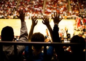 students in sports stadium