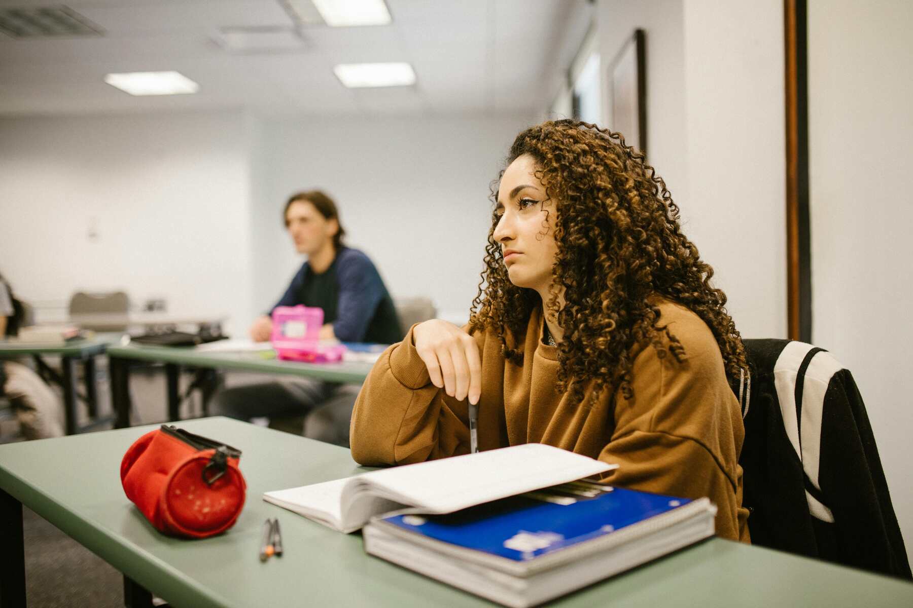 A college student listening to her professor