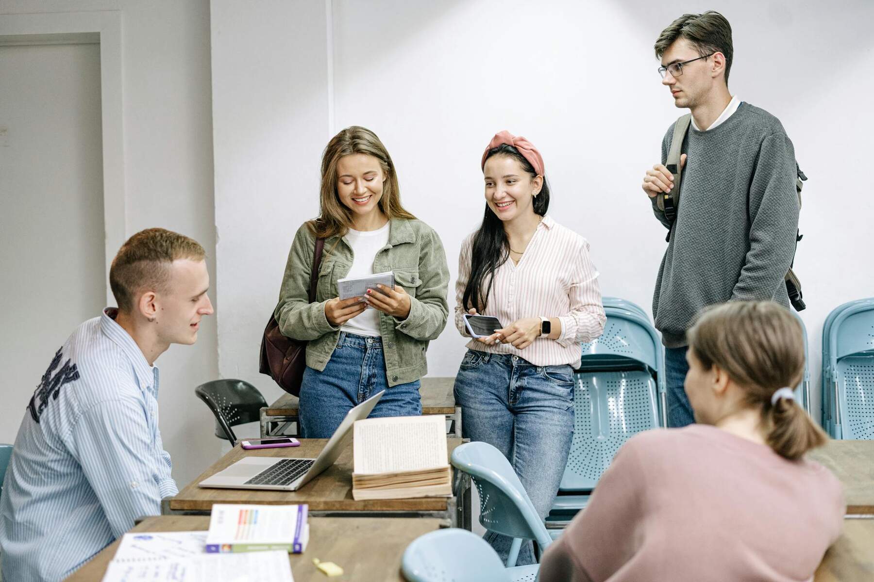 A diverse group of students in a classroom