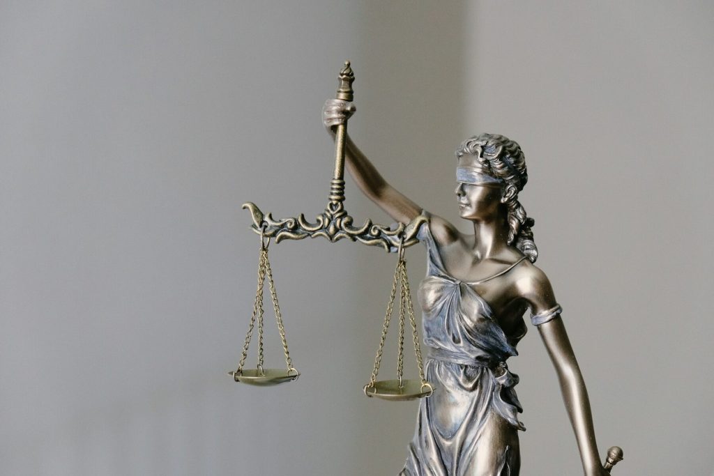 A statue of Lady Justice holding a scale