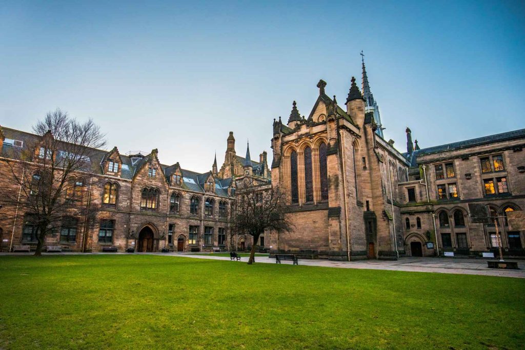 Prestigious looking building on a university campus on a sunny day
