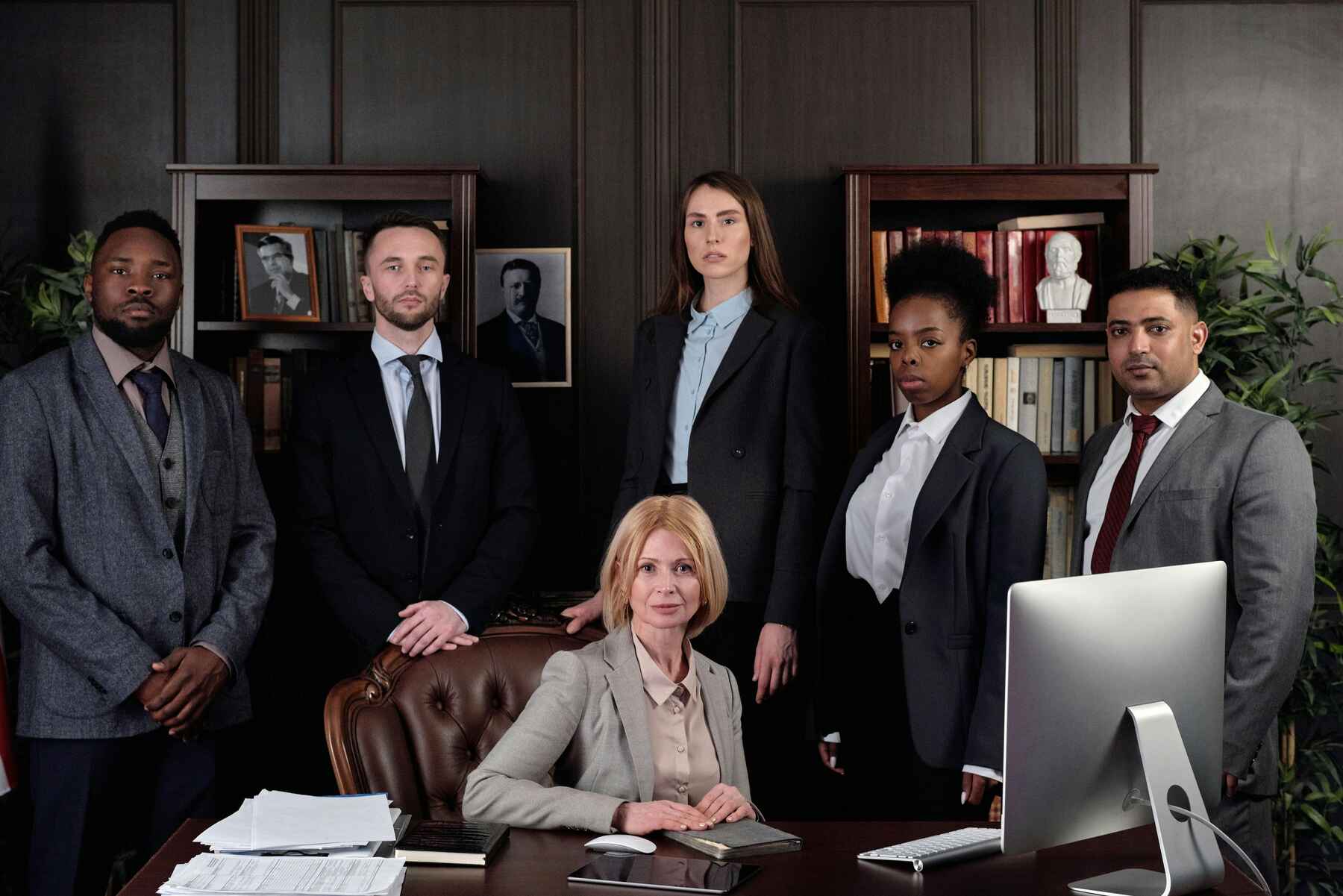 A group of lawyers in their office
