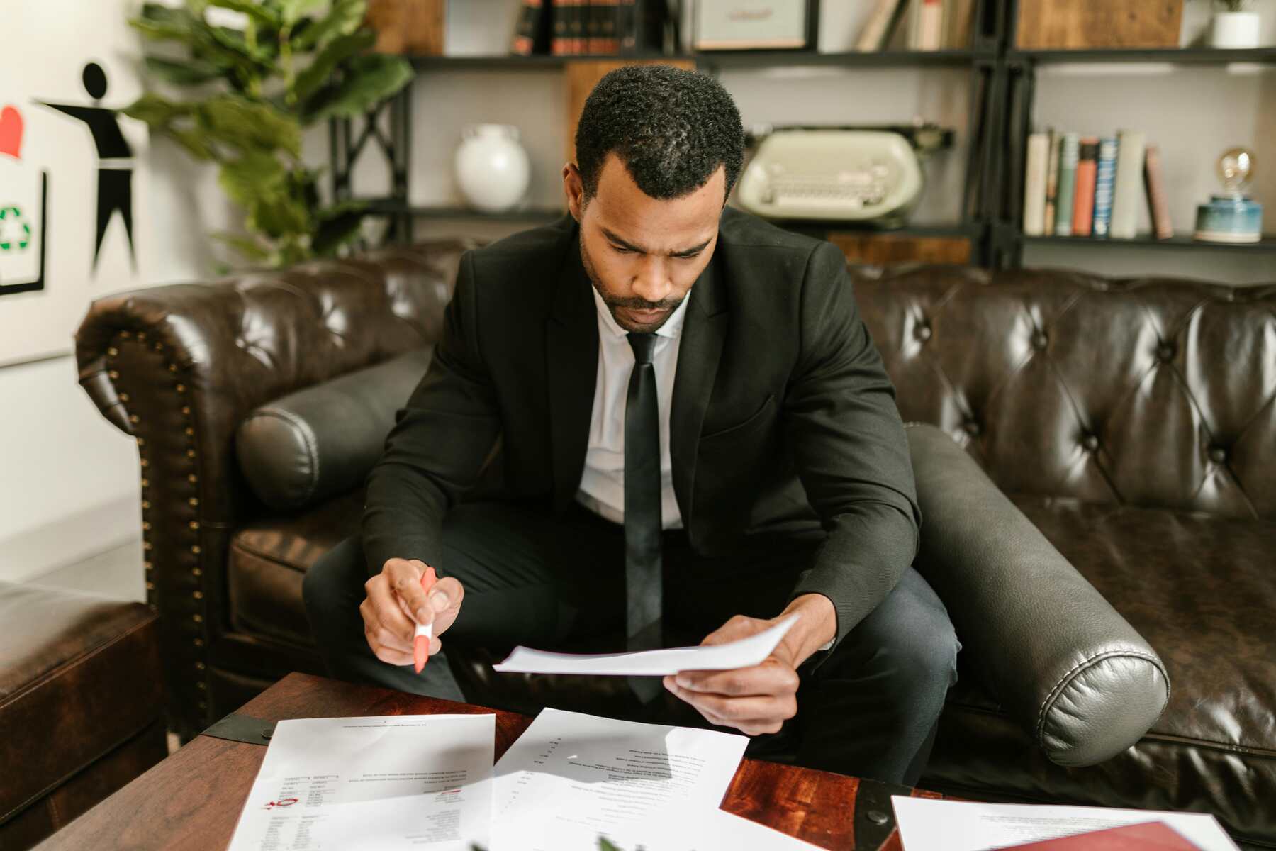 A professional man looking at the papers